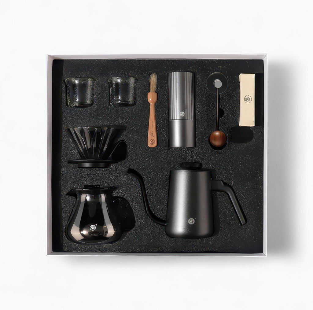 Lastaforest all-in-one pour over coffee kit with black coffee tools including dripper, server, and accessories for brewing.