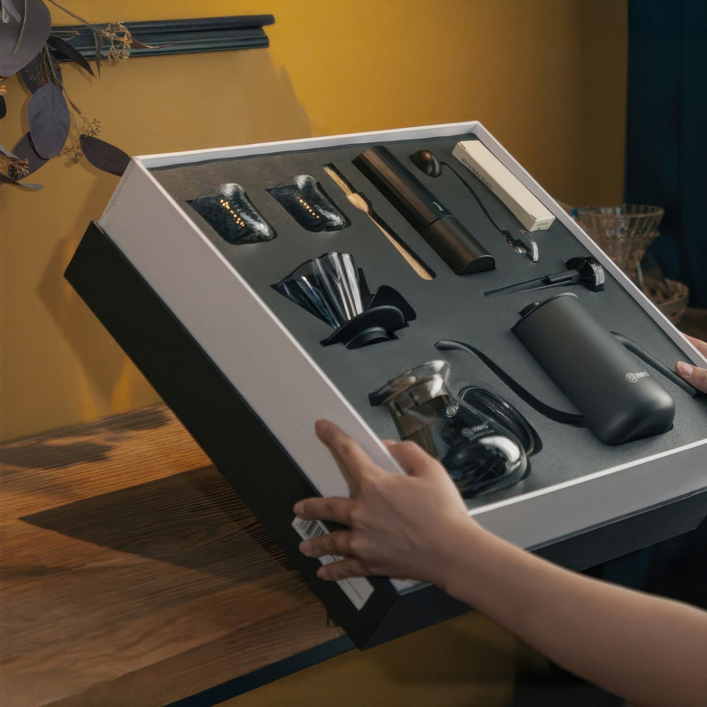 Lastaforest all-in-one pour over coffee starter kit with black coffee tools, including dripper, server, and accessories for brewing.