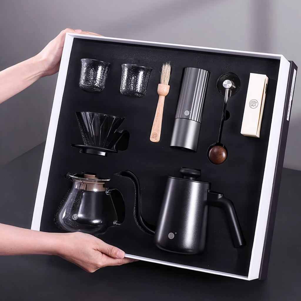 Lastaforest all-in-one pour over coffee kit with black coffee tools, including a dripper, server, and filters for brewing.