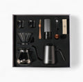 Lastaforest all-in-one pour over coffee kit showing black coffee tools including dripper, server, and accessories in a compact set
