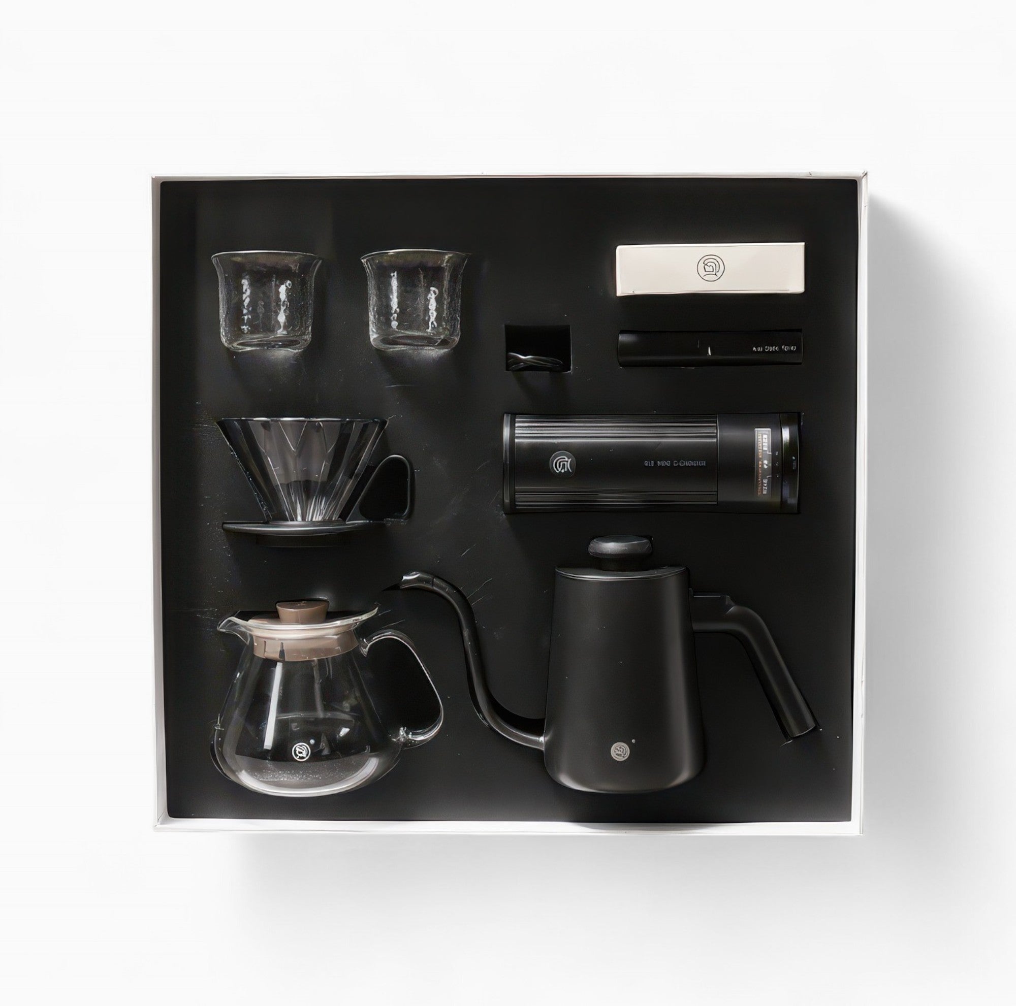 Lastaforest All-in-One Pour Over Starter Coffee Kit with black coffee tools including dripper, server, and accessories for brewing.
