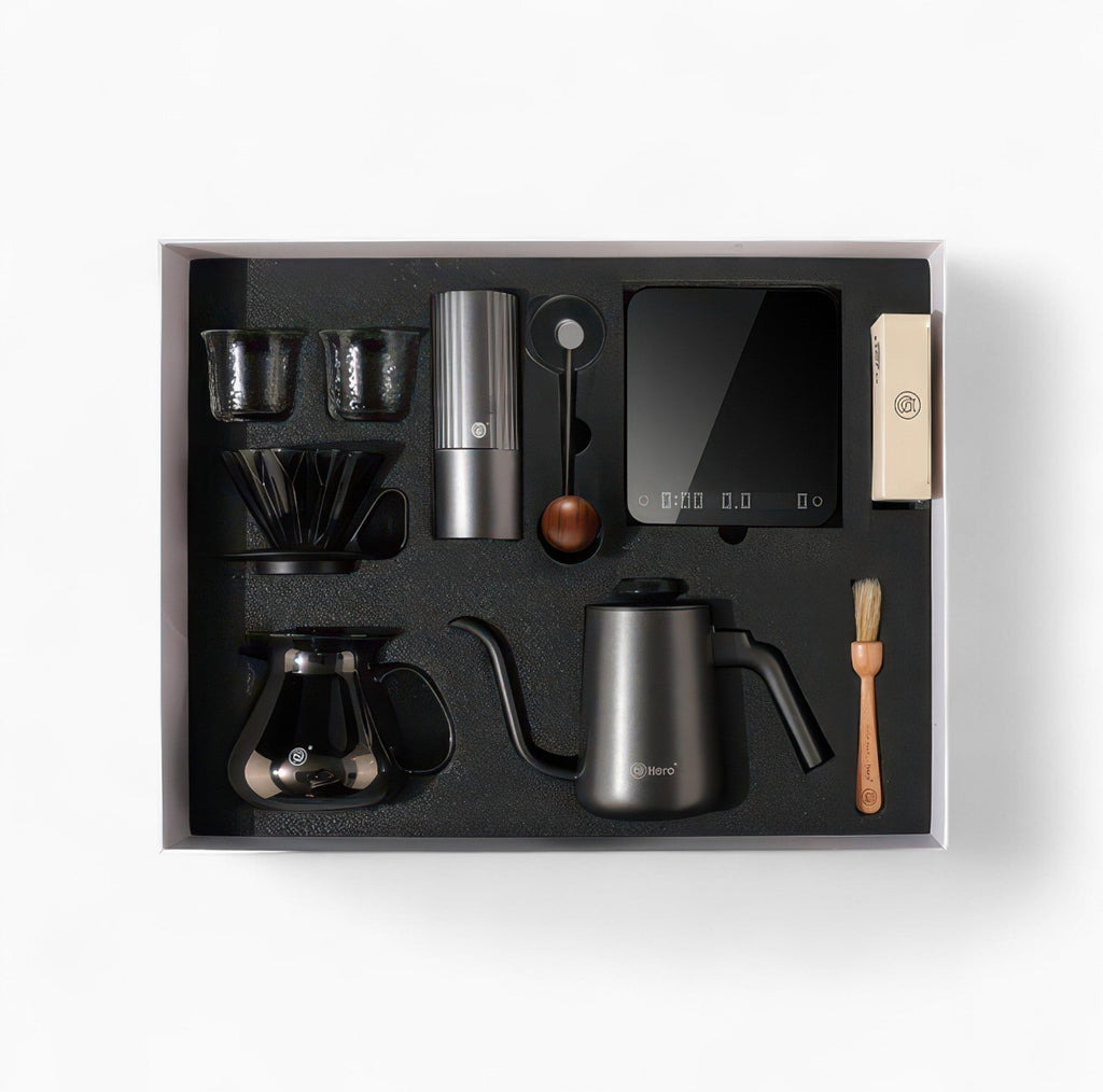 Black All-in-One Pour Over Starter Coffee Kit by Lastaforest with coffee tools including dripper, kettle, and filters.